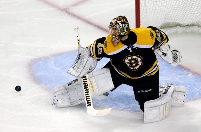 Boston Bruins goalie Tuukka Rask defends the goal against the Pittsburgh Penguins during the second period of Game 4 in the Eastern Conference finals of the NHL Stanley Cup playoffs in Boston, Friday, June 7, 2013.