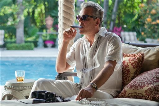 This publicity image released by Starz, shows Danny Huston in a scene from the second season of the series "Magic City," set in Miami, Fla. The second season premieres Friday, June 14 at 9 p.m. on Starz. (AP Photo/Starz, Justina Mintz)