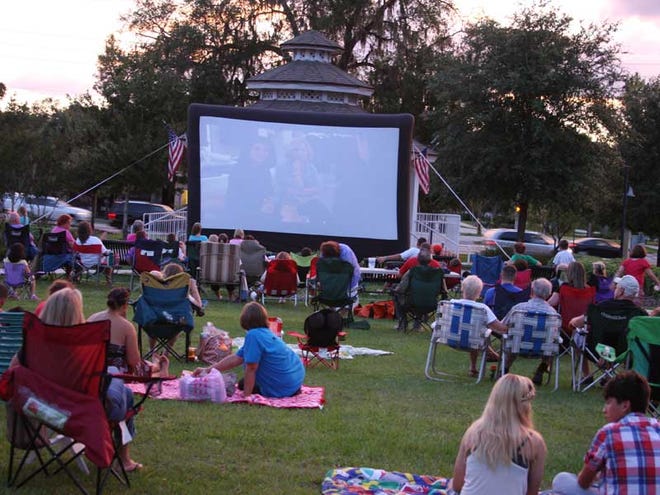Orange City’s Movie in the Park draws a crowd for its first Friday event.