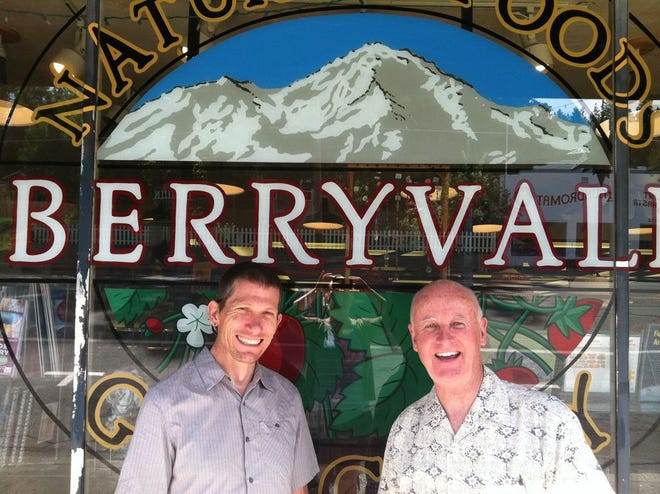 Sean Doyle of Berryvale Grocery, left, with Sam Baxter of the Siskiyou Land Trust. Berryvale is matching donations made during Friday’s fundraiser for the Sisson Garden Greenway Campaign.