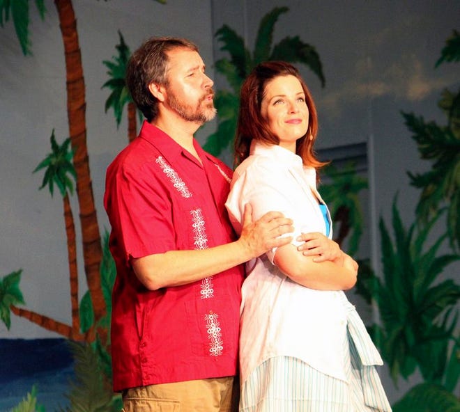 Julie Peterson and Tom Ramseyer perform a number from 'South Pacific' during a final dress rehearsal Wednesday. The production begins tonight and runs through Sunday at the Chautauqua Park Pavilion.