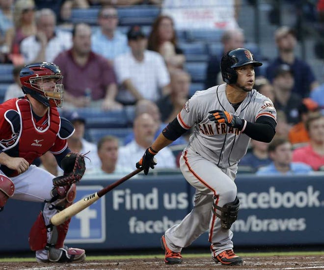 San Francisco's Gregor Blanco drives in a run during the second inning. He also had a leadoff home run against his former team.