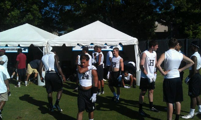 Members of Havelock High School’s football team prepare to take the field in Charlotte during the Carolina Panthers’ sponsored 7-on-7 tournament Friday.