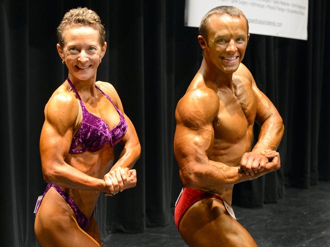 Ms. Spartanburg Mary Jane Michaels and Mr. Spartanburg Matt Lanford strike a pose with their trophies at the Carolina Supernatural Bodybuilding 
competition on Saturday at Spartanburg Memorial Auditorium.