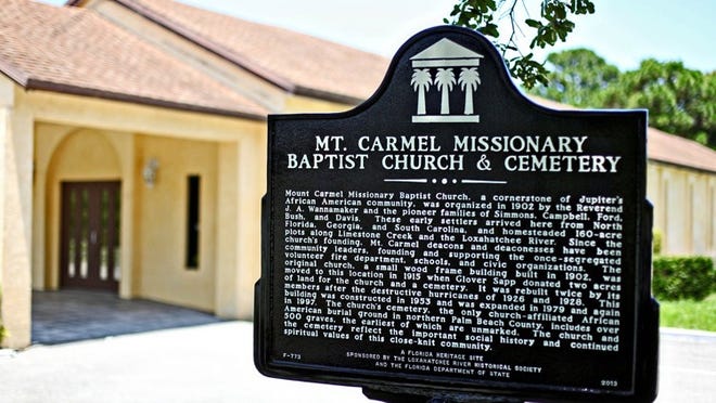 A new State of Florida historic marker at Mount Carmel Missionary Baptist Church and Cemetery in Jupiter on June 15, 2013. (Richard Graulich/The Palm Beach Post)