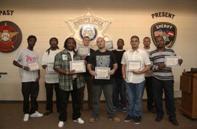 The nine most recent graduates of the Chatham County jail's weeklong training session for its work-release program are pictured. (Photo courtesy Chatham County Sheriff's Office)