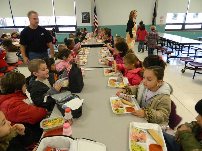 Kindergarteners sit down to lunch Wednesday at Meadows Elementary School in the Topeka Public School district. Parents from the district said the Common Core debate is not something they have focused on.