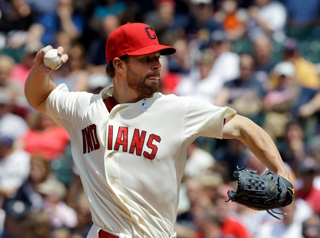 Cleveland Indians starting pitcher Corey Kluber delivers against the Washington Nationals in the sixth inning of a Sunday's game in Cleveland.