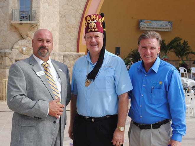 Volusia County Chair Jason Davis, left, stands with Shriners International official Gary Bergenske, center, and Jeffrey Hentz, president and CEO of the Daytona Beach Area Convention & Visitors Bureau, on Monday, June 17, 2013, at a press conference announcing the selection of Daytona Beach as the host city for the Shriners' national convention in July 2018. The city will also host the five-day event in July 2017. An estimated 15,000 to 20,000 people are expected to attend each year.