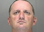 Daytona Beach Fire Department Lt. Brad Dyess, who police say is a member of the Warlocks Motorcycle Club, was charged with domestic battery.