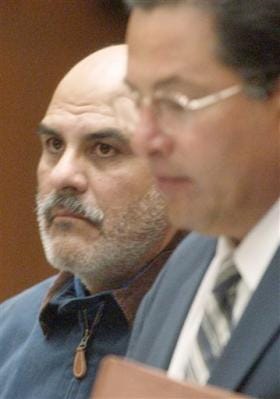 This June 30, 2003 file photo shows John Anthony Salazar, a former priest accused of sexually assaulting two boys in Los Angeles in the 1980s, appearing with his attorney, Daniel Guerrero, right, in Superior Court in Los Angeles for his arraignment. When Salazar arrived in Tulia in 1991, he was warmly welcomed by the Roman Catholic community tucked in the Texas Panhandle. What his new parishioners didn't know was he'd been hired out of a treatment program for pedophile priests land that he'd been convicted for child molestation and banned from the Archdiocese of Los Angeles for life.