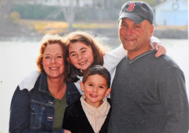 West Bridgewater police Sgt. Gregory Ames and his wife, Cheryl, children Olivia, 14, and Zachary, 9.