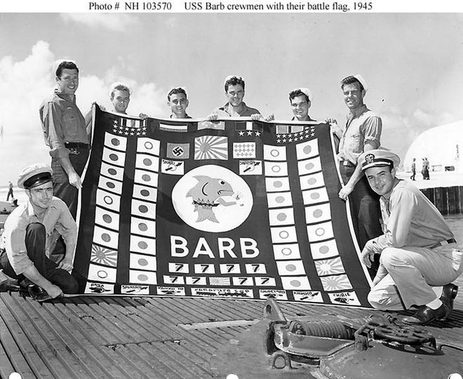 Members of the USS Barb's demolition squad who went ashore in Japan and planted an explosive charge that subsequently wrecked a train.
