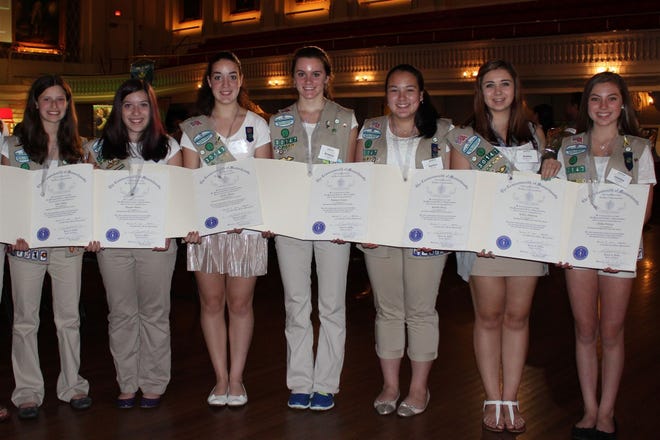 Pictured with their letters of commendation from the Statehouse are from left: Kate
France, Alexa DeCotis, Emma Ryan, Brianna Croteau, Kaitlyn Brock, Kelsey
Anderson and Chelley Donato.  Not pictured are Morgan Blaney and Sydney Blaney.