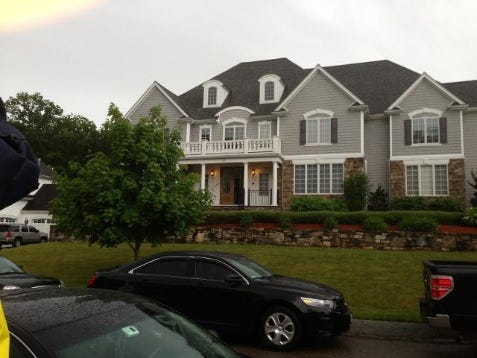 State Police returned to the North Attleboro home of New England Patriots tight end Aaron Hernandez on Wednesday, June 19, 2013, as they continued to investigate a possible homicide.