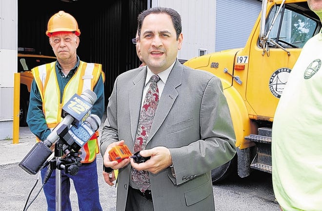 New York State Bridge Authority Executive Director Joseph Ruggiero introduces a personal alarm system, to be worn by contractors painting the Newburgh-Beacon Bridge, during a news conference Tuesday at the bridge maintenance yard in Beacon.