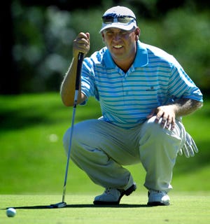 Scott Parel lines up a putt during the 2010 Kandy Waters Memorial Classic at Mount Vintage Plantation and Golf Club.
