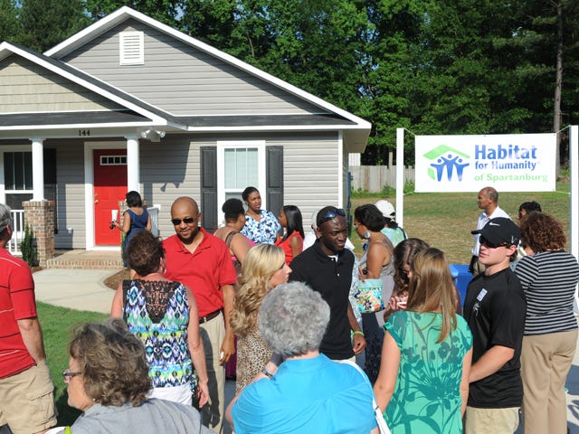 A new Habitat house in Boiling Springs that was dedicated Thursday was built mainly through efforts of a Boiling Springs High school student Aaron Brown. Brown was killed in a car crash before he could see the completion of his efforts. The house is affectionately called "Aaron's Bulldog Habitat House."