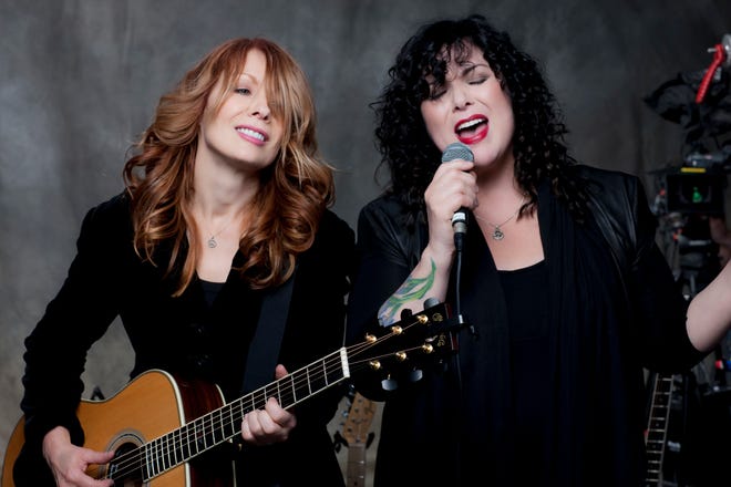 Nancy Wilson, left, and Ann Wilson make up the band Heart, which will perform Friday in Charlotte, N.C.
