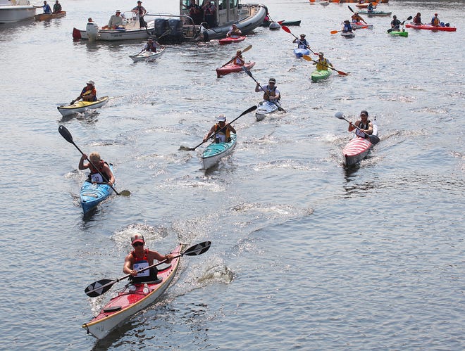 Some of the fleet of participants in the 23rd annual Great River Race on the North River on Saturday, July 20, 2013.