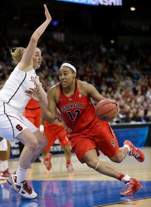 Georgia's Jasmine Hassell in action against Stanford in a regional semifinal in the NCAA women's college basketball tournament Saturday, March 30, 2013, in Spokane, Wash. Georgia won 61-59. (AP Photo/Elaine Thompson)