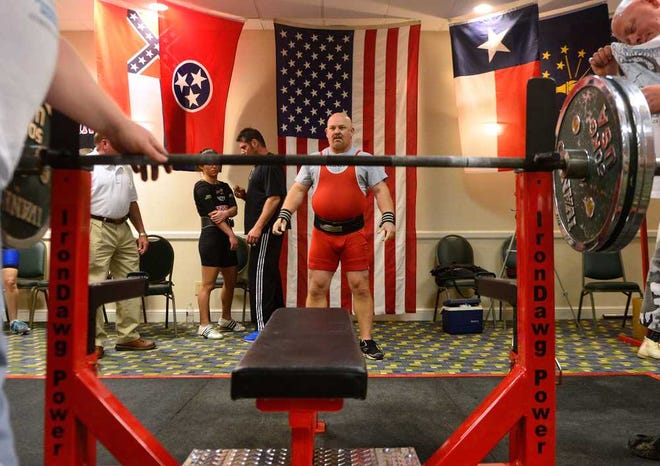 Gary Hatfield prepares to attempt a record bench press lift during the first day of the American Powerlifting Committee National Championships at the Holiday Inn Express in Athens, Ga. on Friday, June 21, 2013.  (Richard Hamm/Staff) OnlineAthens / Athens Banner-Herald