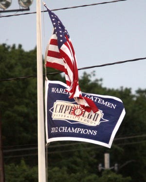 The 2012 Wareham Gatemen CCBL championship flag flies out in right field.