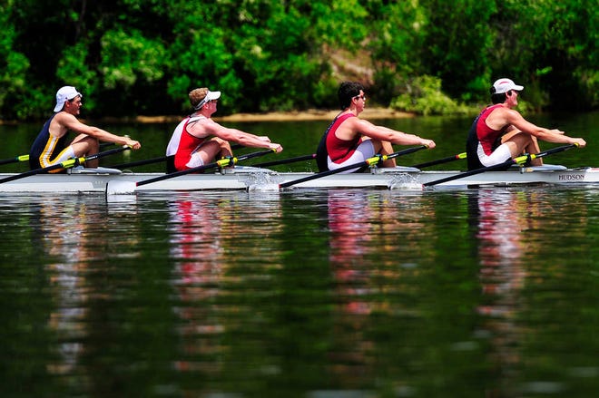 A quad rowing team competes in the U.S. Rowing Southeast Regional Championships at Langley Pond on Sunday.