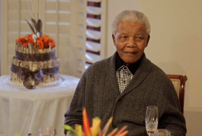 In this Wednesday, July 18, 2012 file photo, former South African President Nelson Mandela as he celebrates his 94th birthday with family in Qunu, South Africa. Nelson Mandela's health has deteriorated and he is now in critical condition, the South African government said Sunday, June 23, 2013. The office of President Jacob Zuma said in a statement that he had visited the 94-year-old anti-apartheid leader at a hospital on Sunday evening and was informed by the medical team that Mandela's condition had become critical in the past 24 hours.