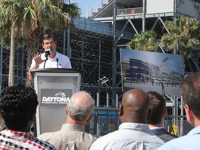 Daytona International Speedway President Joie Chitwood speaks to a crowd outside Daytona International Speedway about the grandstand make over and other developments on ISC property on Tuesday, June 18, 2013.