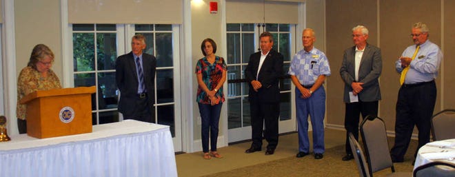 Courtesy of Lynn Bennett The Richmond Hill Exchange Club swore in its officers new officers and directors for the 2013-2014 during a dinner and ceremony at the Richmond Hill City Center last week. Lisa Glisson, past Georgia District Exchange Club President was on hand to install the new administration. Sworn in were, from left: John Gough , president; Shirley Heagerty, treasurer; Barry Hall, director: Bob Mock, director; David Aspinwall, director; and Bob Whitmarsh, immediate past president.