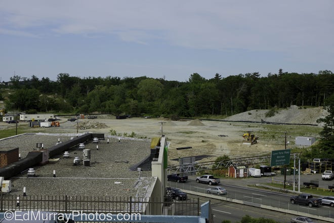 Photographer Ed Murray will be sending us photos throughout the summer showing the progress of the Walmart construction site on Route 1 North next to McDonald’s. This photo shows crews busy with pre-construction work.