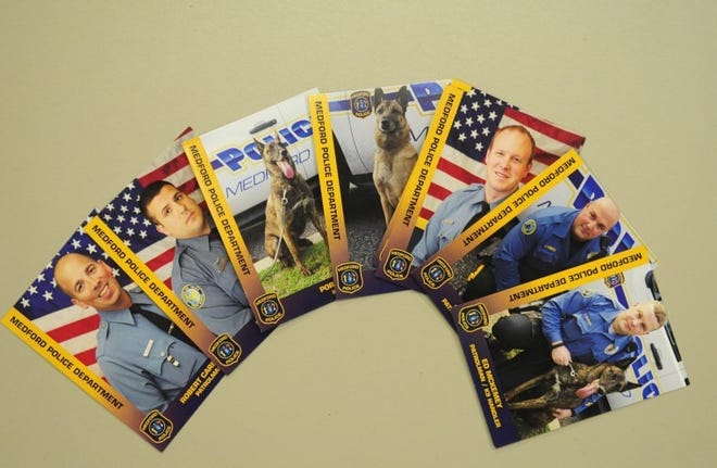Trading cards of Medford police officers. Medford children can get the cards by approaching a police officer.