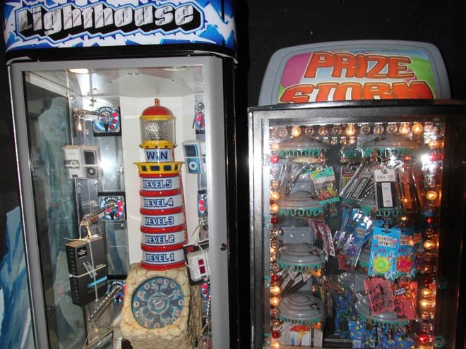 The Lighthouse and Prize Storm games are shown recently at Ormond Lanes in Ormond Beach. Questions have been raised about whether the law passed this year that shut down Internet cafes also can be applied to such games.