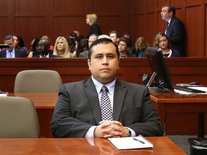 George Zimmerman waits for his defense counsel to arrive Monday in Seminole circuit court for his trial. Zimmerman has been charged with second-degree murder for the 2012 shooting death of Trayvon Martin.