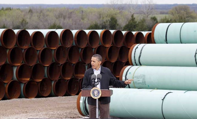 In this 2012 file photo, President Barack Obama speaks at the TransCanada Pipe Yard in Cushing, Okla. The president said Tuesday the proposed Keystone XL pipeline project from Canada to Texas should only be approved if it doesn't worsen carbon pollution. Obama said allowing the oil pipeline to be built requires a finding that doing so is in the nation's interest.