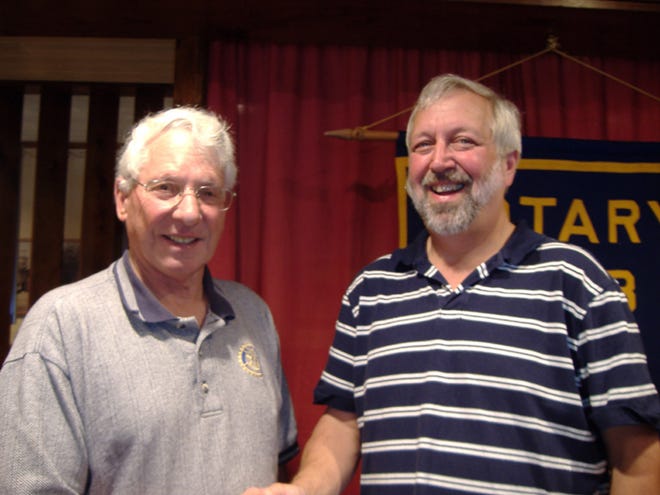 Landscape photographer, Wells Horton, right, was the guest speaker at a recent meeting of the Sherburne Rotary Club. Horton's presentation included sharing some of his photographic art with those in attendance. Pictured with Horton is Rotarian Allan Sawyer.