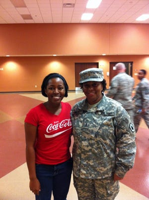 CW3 Sherry Gulley poses with her daughter, Victoria.