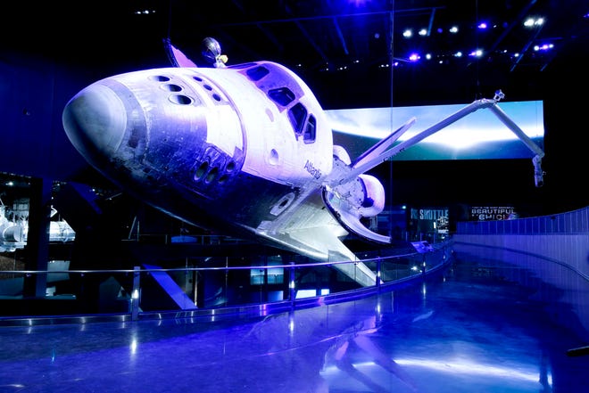 This June 20, 2013 photo shows space shuttle Atlantis on display at the Kennedy Space Center Visitor Complex in Cape Canaveral, Fla. The 900,000 square-foot facility centering around Atlantis will open to the public June 29. (AP Photo/John Raoux)