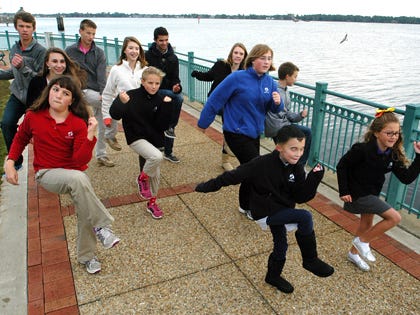 Students from the Epiphany School of Global Studies perform ‘Stomp Out Genocide’ in an October 2012 video-taping at Union Point Park in New Bern.