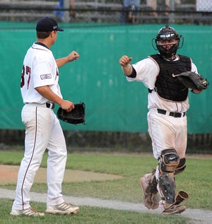 Matt Walsh congratulates Andro Cutura after getting out of a jam Sunday for Wareham in a 3-1 win over Brewster.