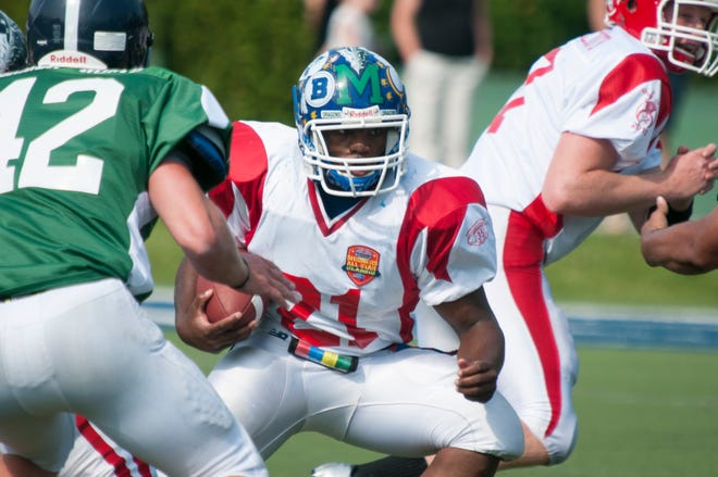 #21 Darien Fernandez of Wareham High plays during the 35th Annual Shriner's All-Star football game played Saturday, June 22, 2013 at Bentley University in Waltham. Photo by K.A. MacDonald