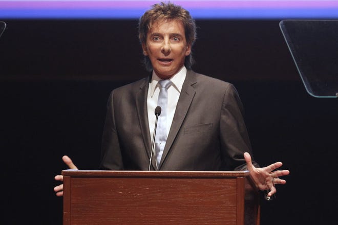 Barry Manilow, shown here in a Sept. 15, 2011 file photo, doesn't tour like he used to, but has no problem showing up for big occasions, like the Fourth of July at the Capitol.