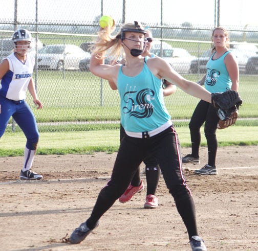 Pontiac's Julie Hogan throws the ball to first base during Wednesday's softball game at the Rec-Plex.