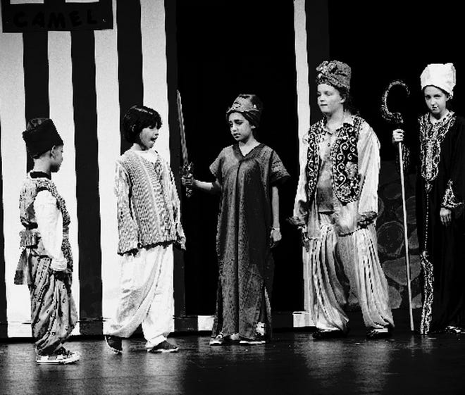 Giovanni Nepote, left, Jenni Sakakura, Emery Garcia, Mallory Schwark and Kayleigh Puckett rehearse in Linden for “Aladdin.”