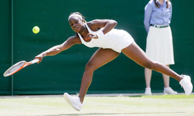 Sloane Stephens hits a shot to Petra Cetkovska in their singles match at Wimbledon on Saturday in London. (Alastair Grant/AP)