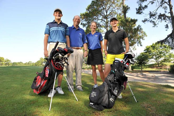 From left to right: Sam, 16, parents Chris and Kristi, and Emily Uhland, 15 at the Jacksonville Golf & Country Club. Sam and Emily combined to travel more than 12,000 miles in 67 days to participate in junior golf tournaments, including a team event Sam played at St. Andrews in Scotland.  Bruce.Lipsky@jacksonville.com