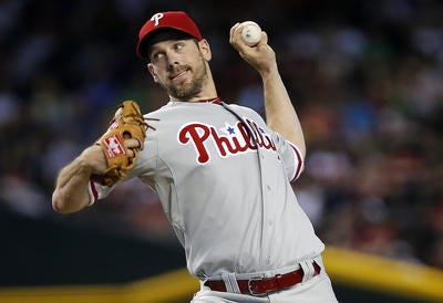 Philadelphia Phillies pitcher Cliff Lee delivers against the Arizona Diamondbacks during the first inning of a baseball game on Saturday, May 11, 2013, in Phoenix. (AP Photo/Matt York)