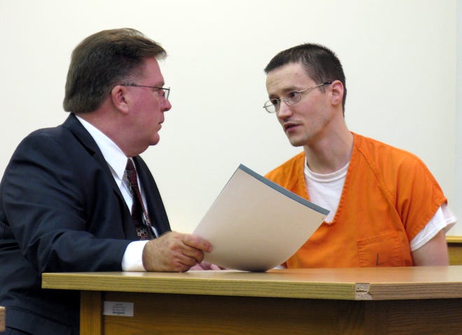 Jeremy Snyder, 31, of Herkimer, right -- who once went by the nickname "Harry Potter" -- looks at his defense attorney, Kurt Schultz, in Herkimer County Court on Monday, July 1, 2013, moments before he was sentenced to 8 1/2 years in prison for attempting to have sex with a 13-year-old girl in 2008.