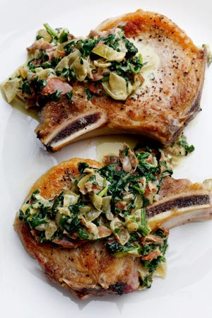 Pork chops with spinach-prosciutto sauce